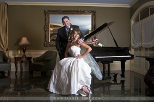 James & Marah Silvestri, Roman Jewelers' wedding contest winners in front of a grand piano in wedding attire