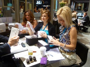 Three members of the Roman Jewelers team at a jewelry show in Las Vegas