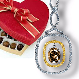 Diamond necklace next to a heart box of chocolates